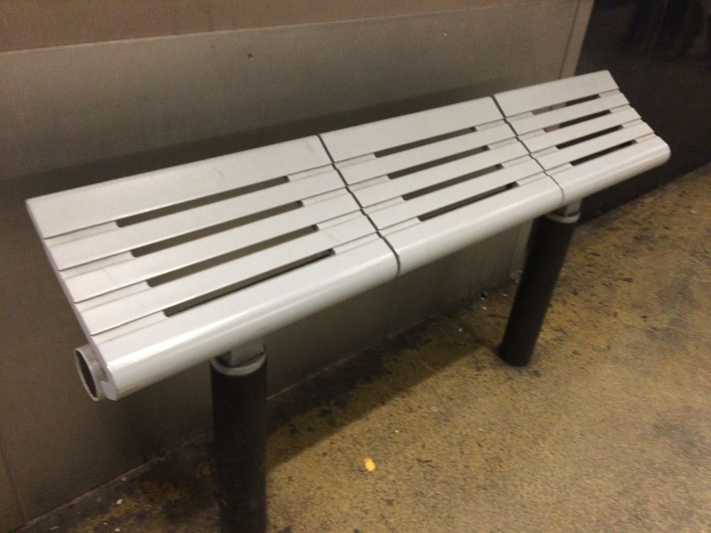 Photo of a sloped bench design captured by Cara Chellew, a Toronto-based researcher who focuses on the design, regulation and politics of public spaces. She compiles photographs of defensive architecture on her website <a href="https://www.defensiveto.com" target="_blank" target="_blank">#defensiveTO</a>. 