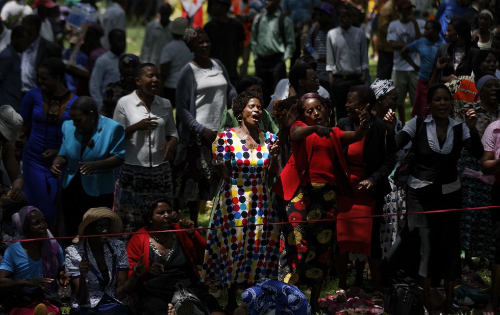 People gather to pray for the country in a park near Parliament on November 21.