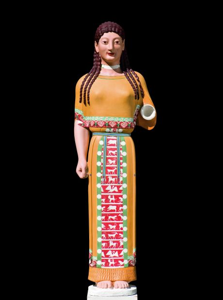 This reconstruction of the Peplos kore is made of plaster cast with natural pigments in egg tempera. Residues of red, blue, green and yellow paint were found on the figure's hair, eyes, belt and garments. 