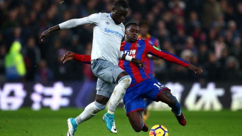 Everton's Oumar Niasse of Everton is tackled by Crystal Palace's Jeffrey Schlupp.