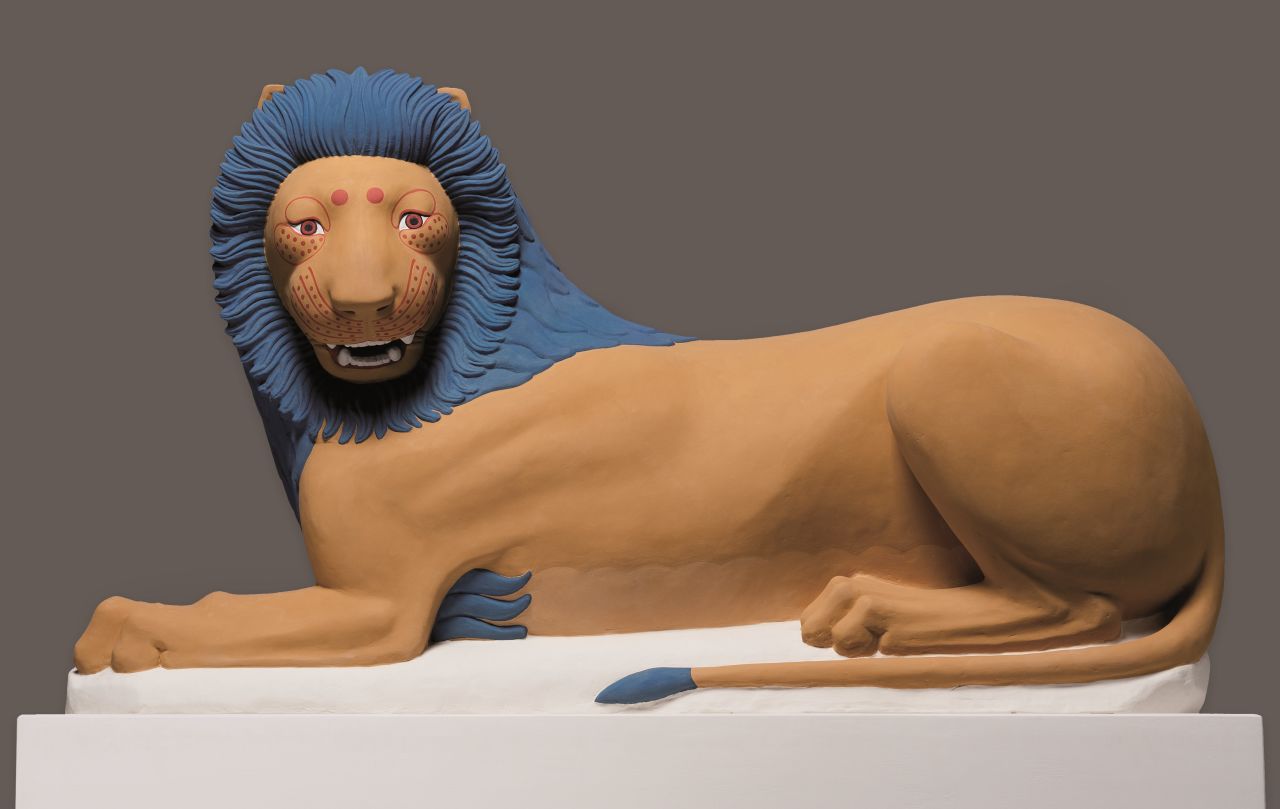 This reconstruction of a crouching Lion from Loutraki is made from a plaster cast with natural pigments in egg tempera.