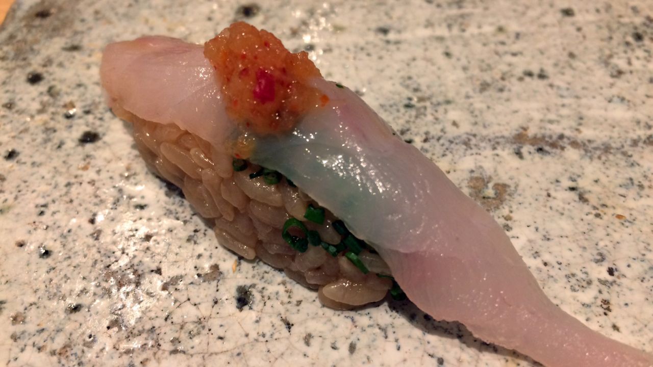 A piece of 'fugu' sushi served at a restaurant in Tokyo.