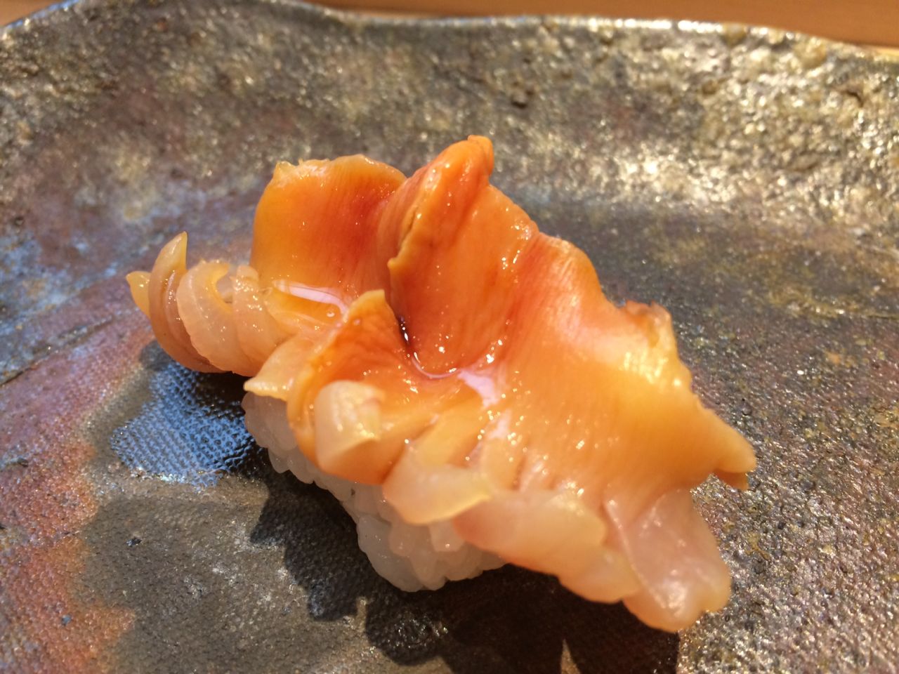 <strong>Ark shell:</strong> "If you order Ark shell (<em>akagai</em>), you will hear the pleasing sound of the shellfish striking the cutting board, which tightens the flesh," says Hanada. "The shellfish is sliced to slowly open, as if a magnificent flower was blooming." 
