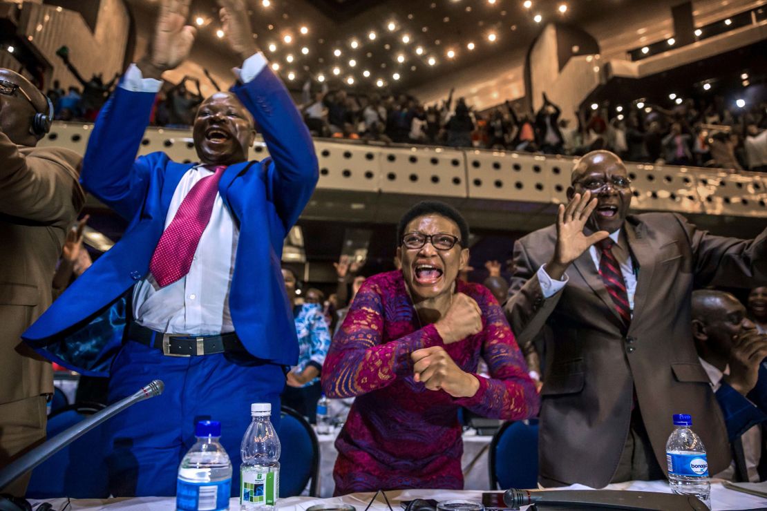Zimbabwe's members of Parliament celebrate after Mugabe's resignation.