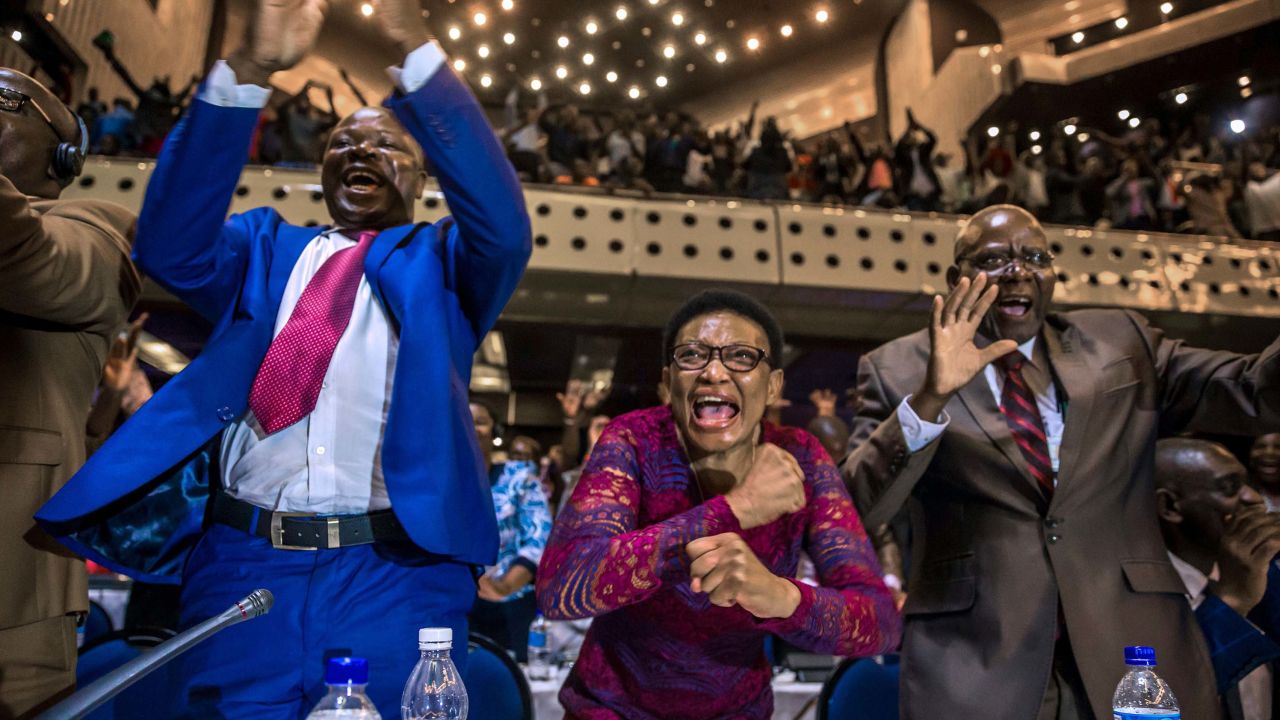 Parliamentarians celebrate Mugabe's resignation on Tuesday.