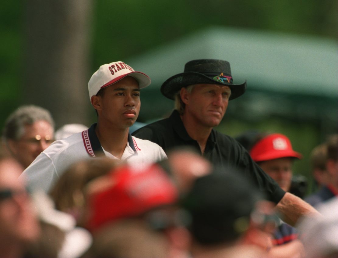 Greg Norman and a young amateur Tiger Woods during a practice round at the 1995 Masters.