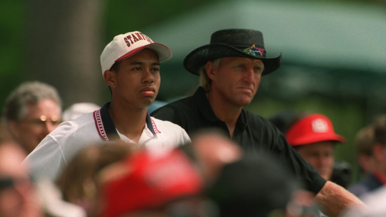 Greg Norman and a young amateur Tiger Woods during a practice round at the 1995 Masters.
