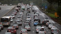 MILL VALLEY, CA - DECEMBER 03:  Cars sit in miles-long traffic jam on southbound highway 101 as they approach a flooded section of the freeway on December 3, 2014 in Mill Valley, California. The San Francisco Bay Area is being hit with its first major storm of the year that is bringing heavy rain, lightning and hail to the region. The heavy overnight rain has caused flooding which has blocked several roadways and caused severe traffic backups.  (Photo by Justin Sullivan/Getty Images)