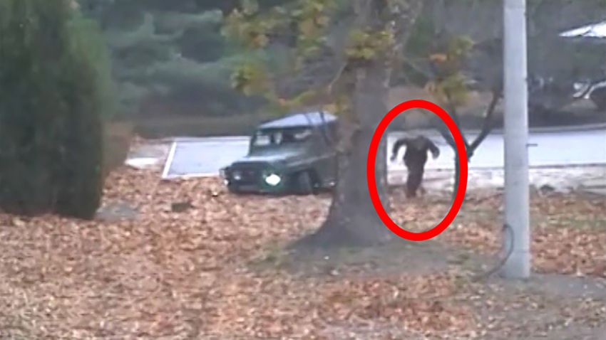 A North Korean defector darts across the DMZ dividing the two Koreas in this screenshot of handout video provided by the United Nations Command.