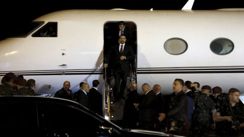 Hariri arrives at the airport in Beirut late Tuesday.