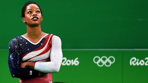 US gymnast Gabby Douglas won gold in the team event at the 2016 Rio Olympics.