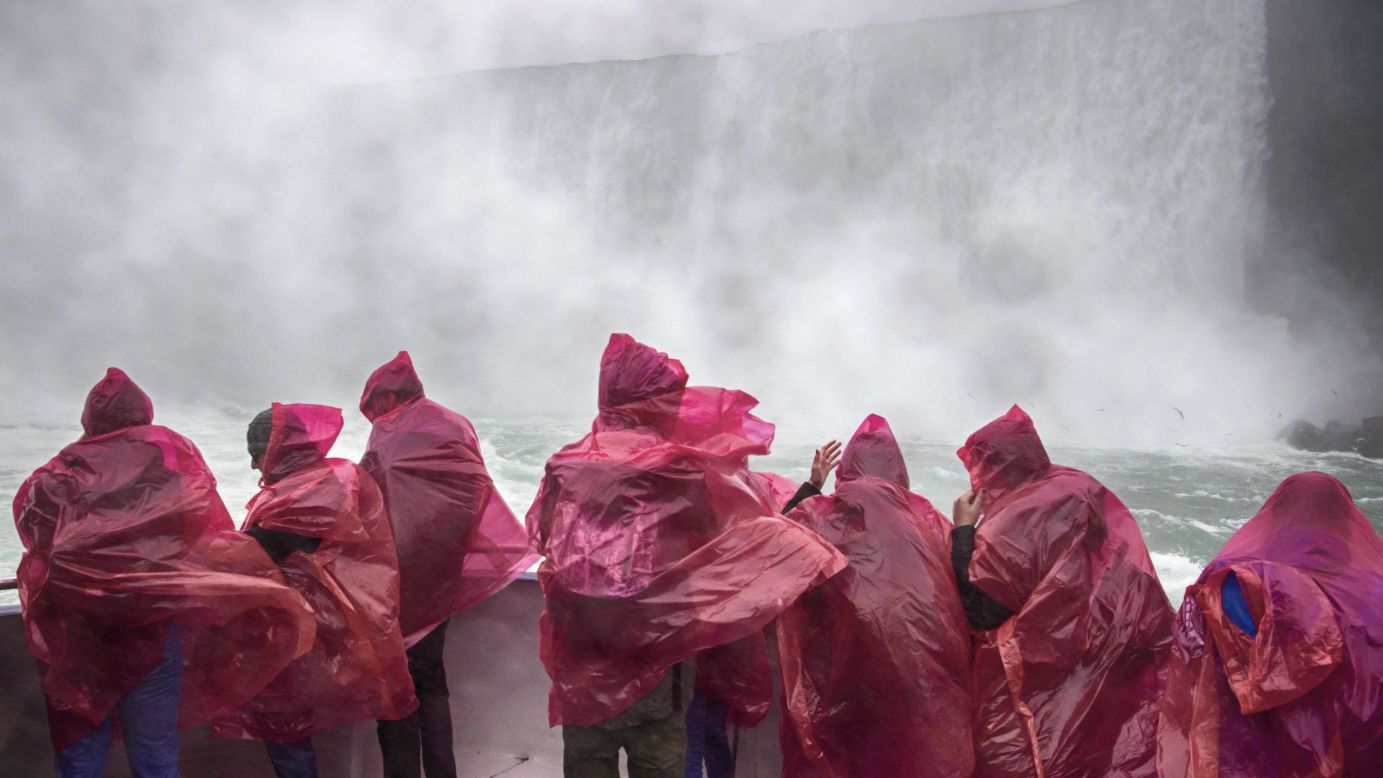 <strong>Niagara Falls, Canada: </strong>Tourists put their rain ponchos to the test while riding a ferry on the Ontario side of Niagara Falls on an October day in 2017. 