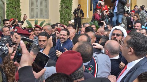Saad Hariri (center) is welcomed by his cheering supporters in Beirut on Wednesday.