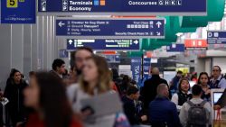 Passengers walk in Terminal 3 at O'Hare airport in Chicago, Tuesday, Nov. 21, 2017. Officials with the Illinois Department of Transportation and Illinois State Police say the ramped up enforcement efforts involving more than 150 law enforcement agencies will end early Monday. (AP Photo/Nam Y. Huh)