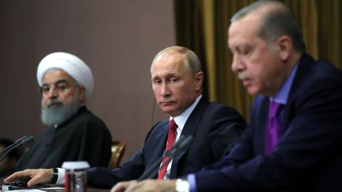 Russian President Vladimir Putin, center, addresses reporters with Iranian President Hassan Rouhani, left, and Turkish President Recep Tayyip Erdogan after a meeting on Syria in Sochi, Russia, on Wednesday.