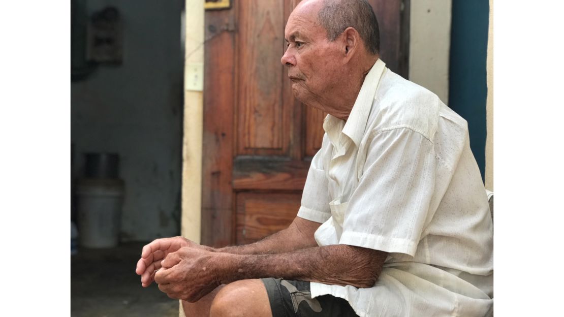 Jose Morales lives in fear his damaged home in Yabucoa will be swept into the Caribbean.