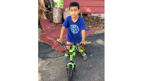 Elian Nieves, 6, gave his donated clothes to friends who were needier.