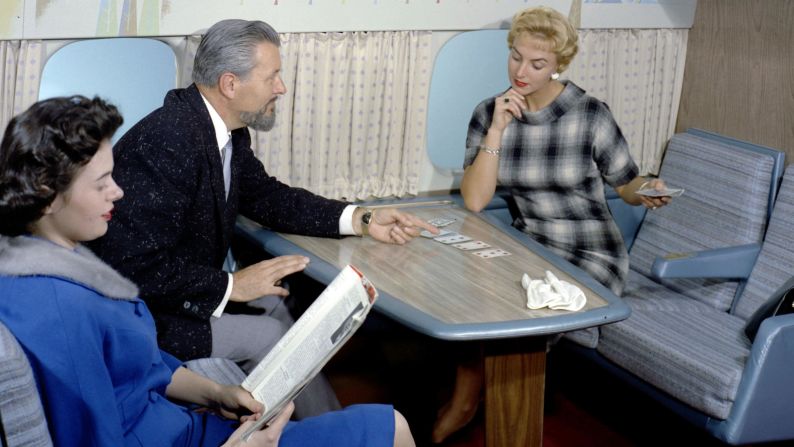 <strong>Card sharps: </strong>Either Graybeard is mansplaining the rules of Poker, or he's been caught in an elaborate sting as the woman in the blue dress signals his hand to her fellow hustler.