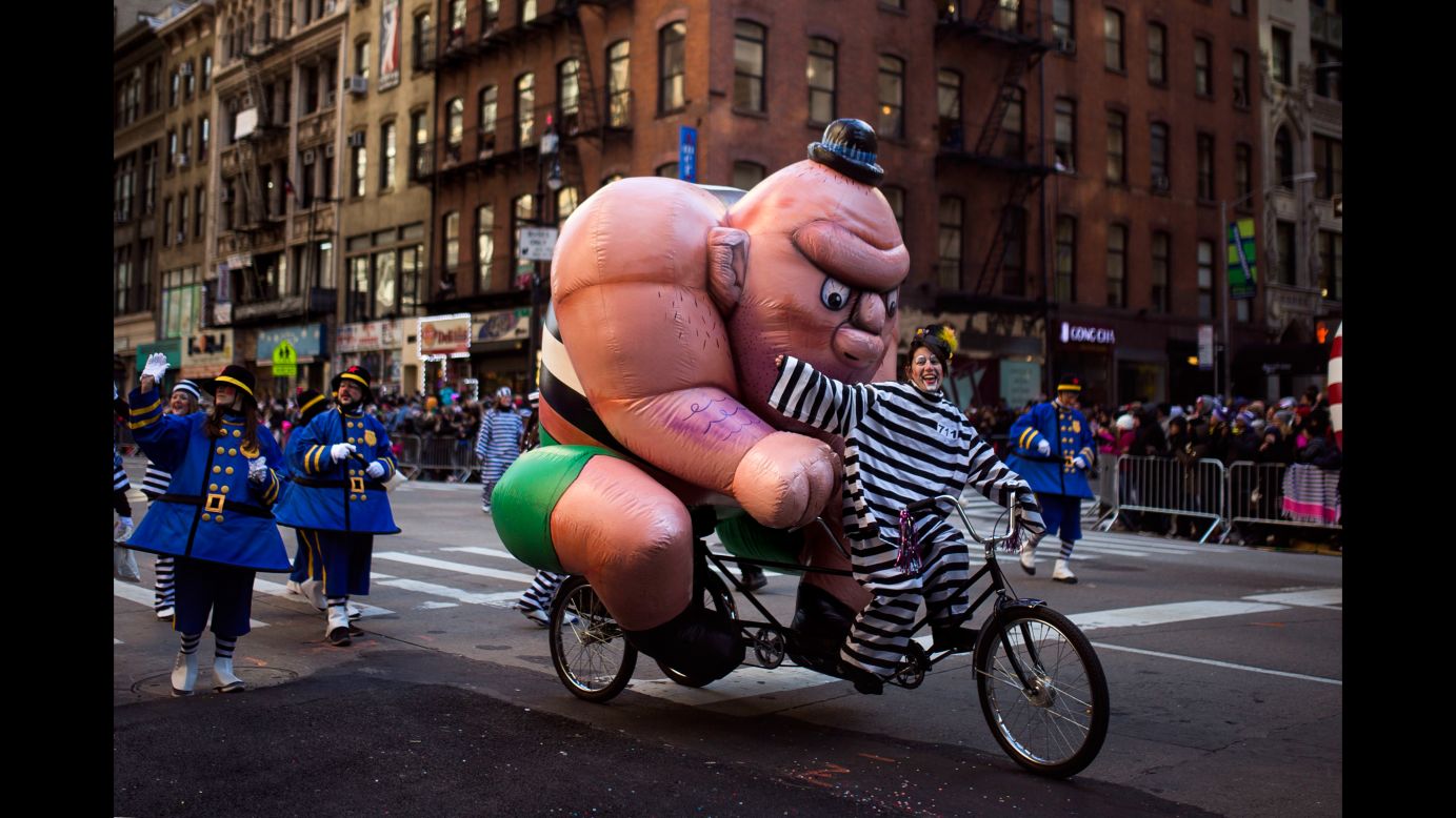 A participant bikes along Sixth Avenue.