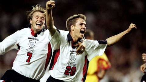 Michael Owen celebrates a goal with England teammate David Beckham at the 1998 World Cup.