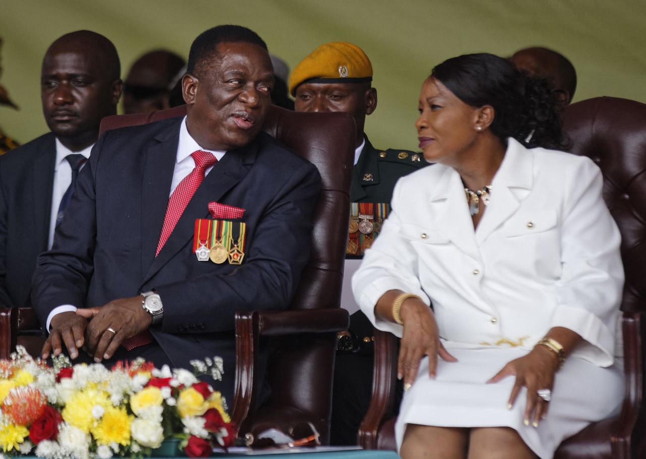 Mnangagwa sits with his wife, Auxillia, during the ceremony.
