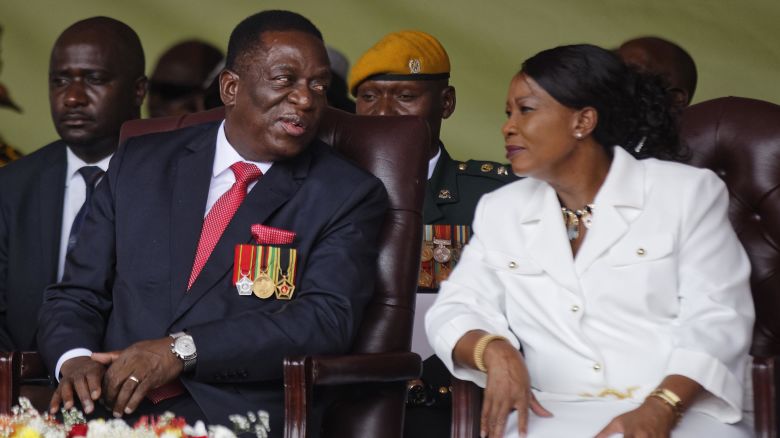 Mnangagwa sits with his wife, Auxillia, during the ceremony.