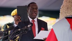 Emmerson Mnangagwa is sworn in as President at the presidential inauguration ceremony in the capital Harare, Zimbabwe Friday, Nov. 24, 2017. Mnangagwa is being sworn in as Zimbabwe's president after Robert Mugabe resigned on Tuesday, ending his 37-year rule. (AP Photo/Ben Curtis)