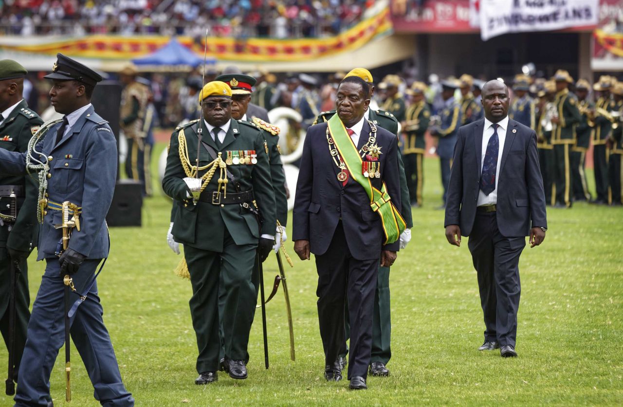 Mnangagwa inspects the military parade after being sworn in.