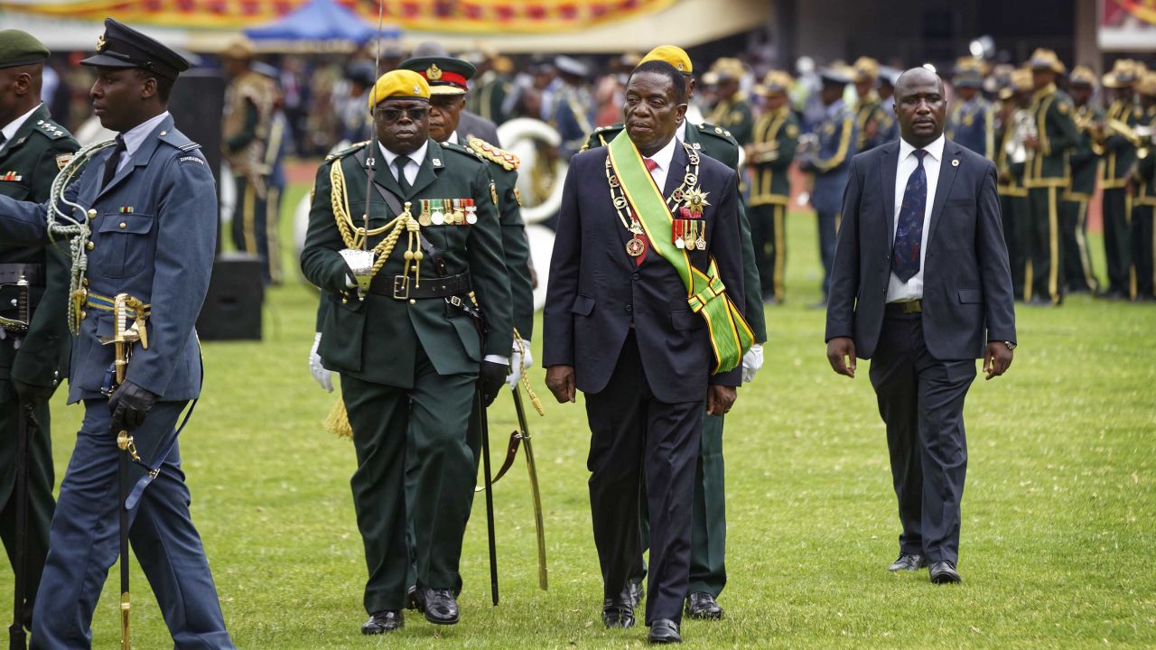 Emmerson Mnangagwa inspects the military parade after being sworn.
