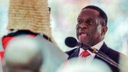 New interim Zimbabwean President Emmerson Mnangagwa is officially sworn-in by Chief judge of the Supreme Court, Chief Justice Luke Malaba during a ceremony in Harare on November 24, 2017.
Emmerson Mnangagwa was sworn in as Zimbabwe's president on November 24, marking the final chapter of a political drama that toppled his predecessor Robert Mugabe after a military takeover. Mnangagwa, until recently one of Mugabe's closest allies, took the oath of office at the national sports stadium on the outskirts of Harare to an explosion of cheering from the full-to-capacity crowd.
 / AFP PHOTO / Jekesai NJIKIZANA        (Photo credit should read JEKESAI NJIKIZANA/AFP/Getty Images)