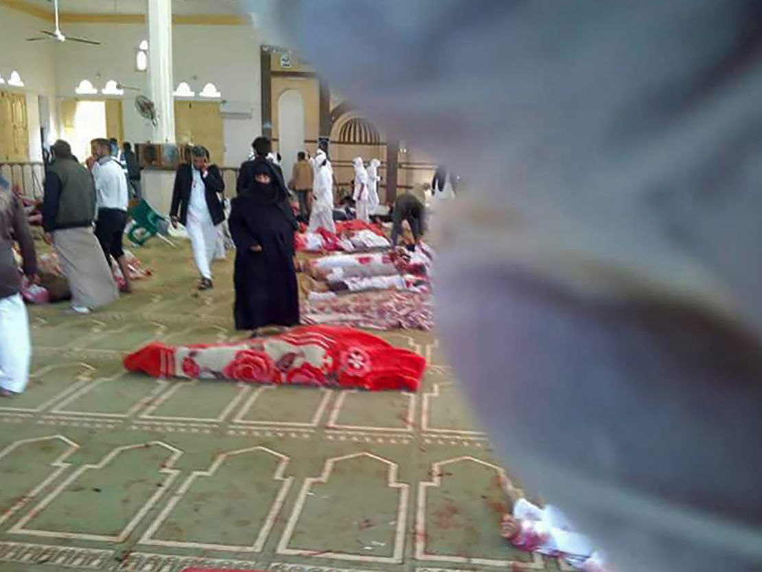 Bodies lie on the floor of al Rawdah mosque in the northern Sinai after a gun and bomb attack Friday.