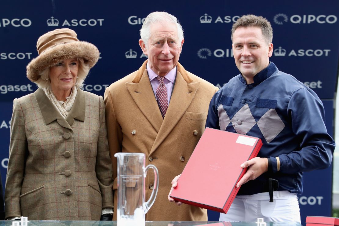 Owen celebrates with Camilla, Duchess of Cornwall and Prince Charles, Prince of Wales
