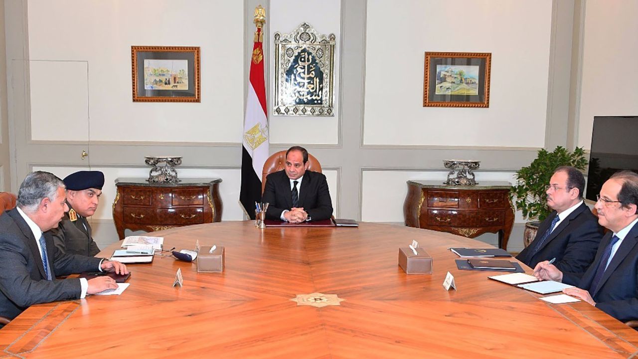 President Abdel Fattah el-Sisi, center, meets with officials in Cairo after the mosque attack.