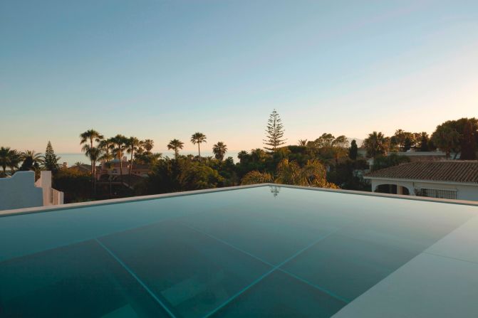 A private residence, the three storied house allows its inhabitants to swim on the roof while enjoying the views of the Mediterranean. 