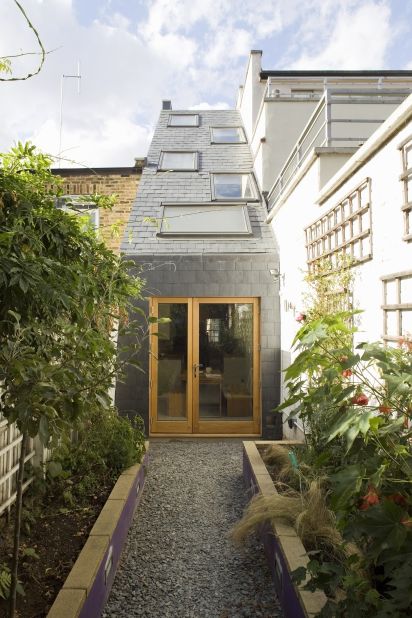 Slim house london sit between two terraced houses, measuring just 2.3 meters (7.5 feet) internally architects Alma-Nac were given the task of bringing natural light into the building. 