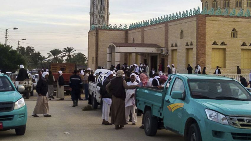 AL ARISH, EGYPT - NOVEMBER 24:  People gather at the site of the Egypt Sinai mosque bombing in Al-Arish, Egypt on November 24, 2017. The death toll from a bomb that went off outside a mosque in the city of Al-Arish in the northern Sinai Peninsula following Friday prayers has climbed to a whopping 235, according to official sources. At least 109 others were injured in the blast, which occurred in the citys Al-Rawda neighborhood. 
 (Photo by Stringer/Anadolu Agency/Getty Images)