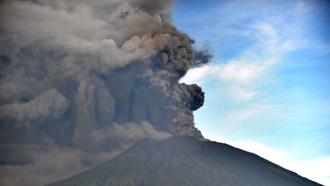 Mount Agung sent smoke rising thousands of meters into the air, shutting down flights.
