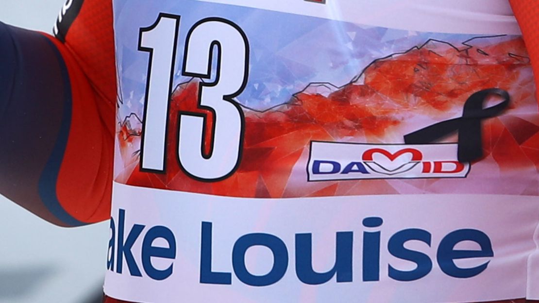 Skiers had a heart-shaped sticker with the initials 'DP' on their helmets and his name on their bibs in honor of David Poisson, who died in a training crash in November.