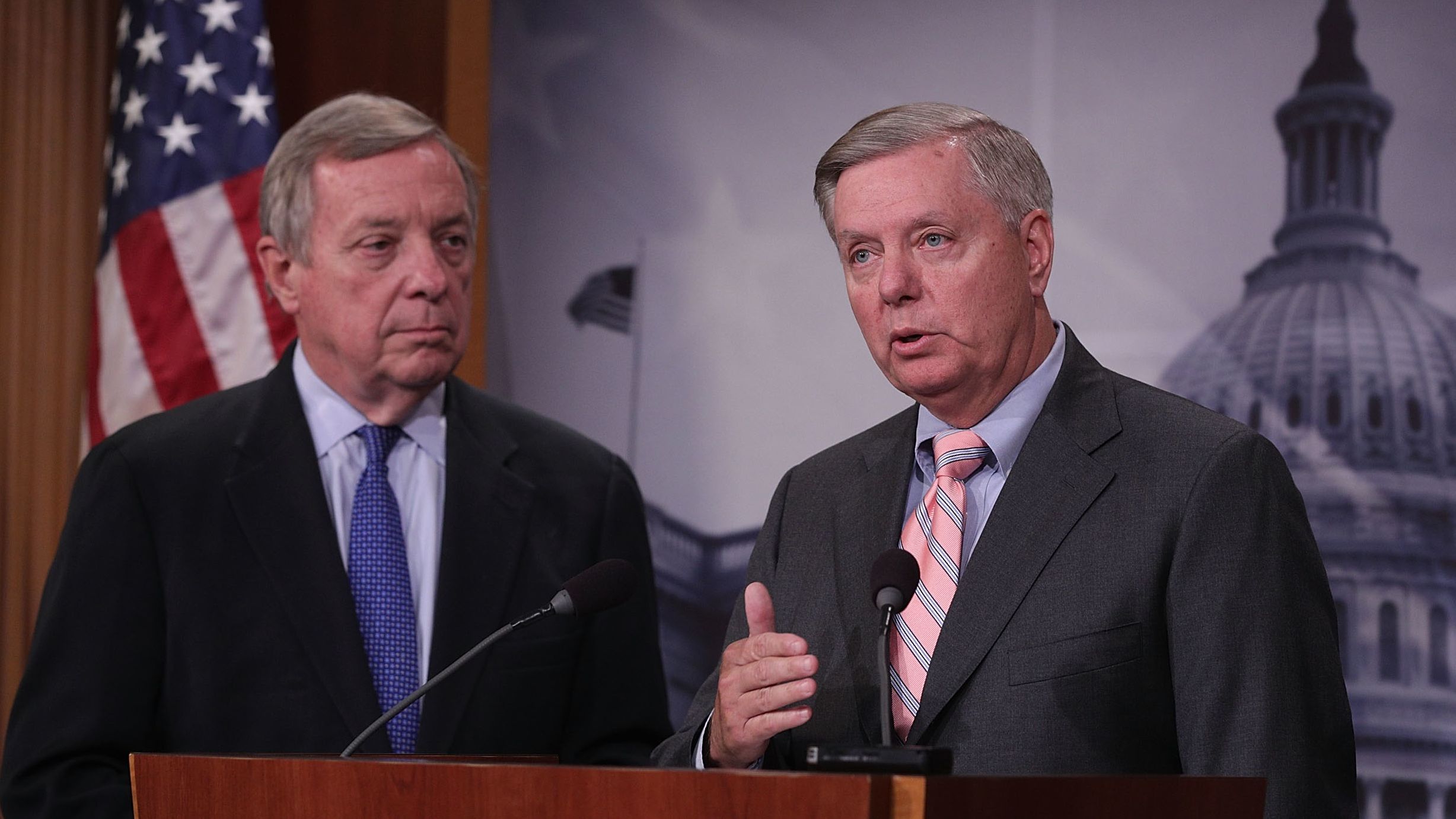Sens. Dick Durbin, D-Illinois, and Lindsey Graham, R-South Carolina, speak during a news conference at the US Capitol September 5, 2017 in Washington.