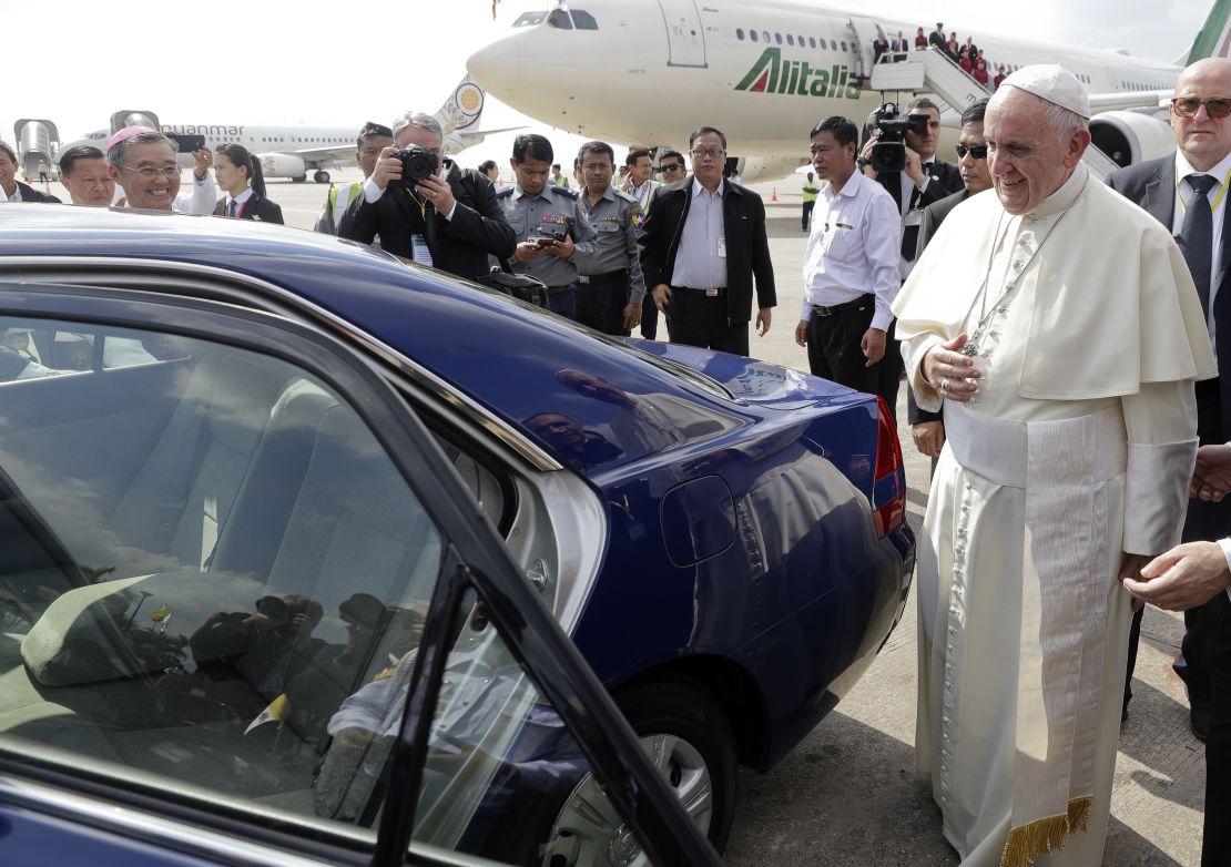 Pope Francis prepares to leave the airport.