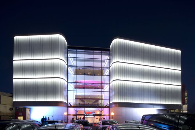 Low-energy LED lighting illuminates the facade of The Point, a conference center and seating area at the Old Trafford Cricket Ground in Manchester, UK.