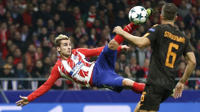 Atletico Madrid star Antoine Griezmann volleys the ball to score a spectacular goal in the Champions League match against Roma on Wednesday, November 22. Atletico won 2-0 over their Italian opponents.