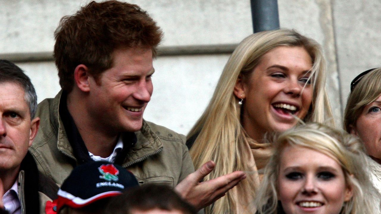 Harry and his girlfriend at the time, Chelsy Davy, watch a rugby match in London in 2009.