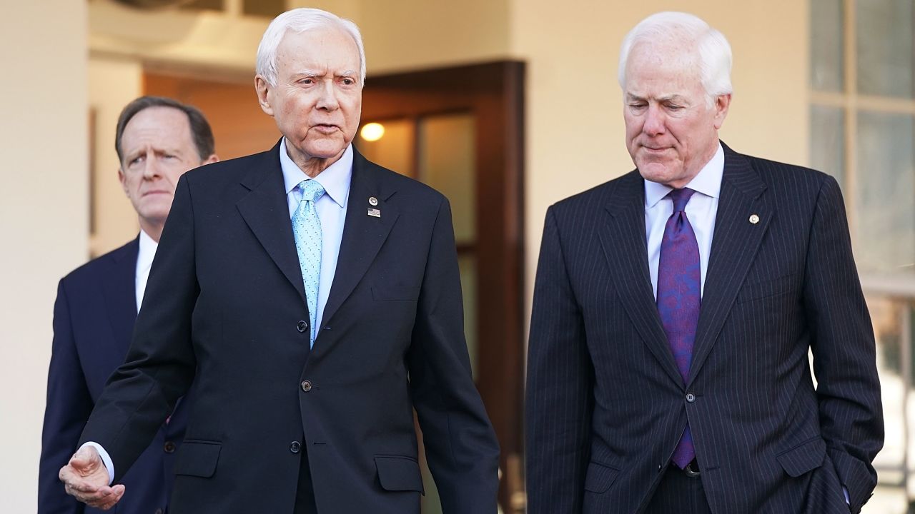 Senate Finance Committee members Sen. Pat Toomey (R-PA) (L) and Sen. John Cornyn (R-TX) (R) walk out of the West Wing with Chairman Orrin Hatch (R-UT) following a lunch meeting with U.S. President Donald Trump at the White House November 27, 2017 in Washington, DC. Senate Republicans hope to pass tax reform and tax cut legislation this week and move closer to Trump's goal of signing it before the end of the year.