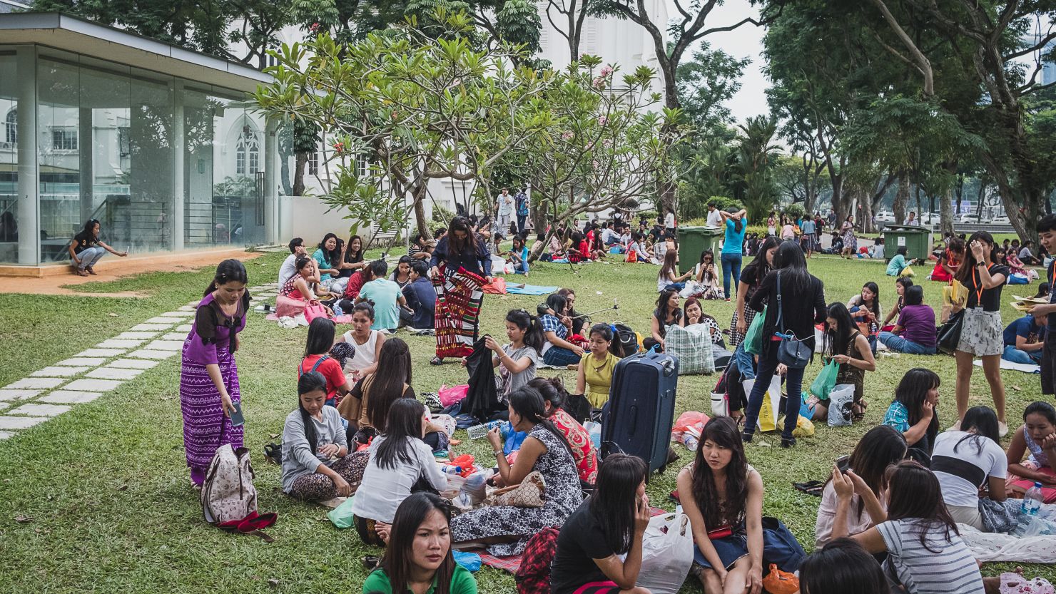 Domestic workers picnic in a park in Singapore March 19, 2017. 