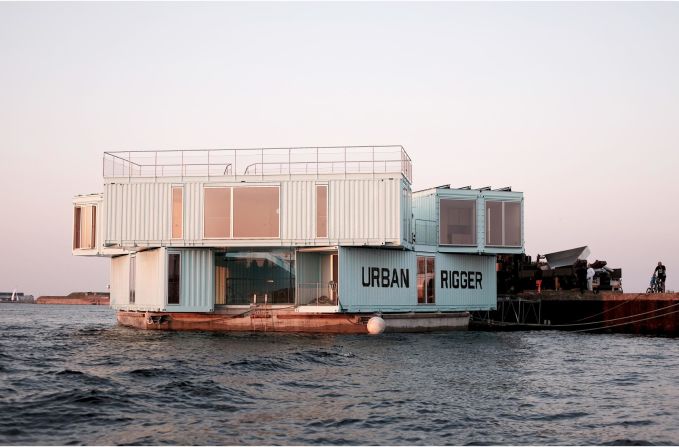 The Urban Rigger in Copenhagen by BIG Architects consists of shipping containers stacked on a floating platform to create this bobbing student halls of residence. 