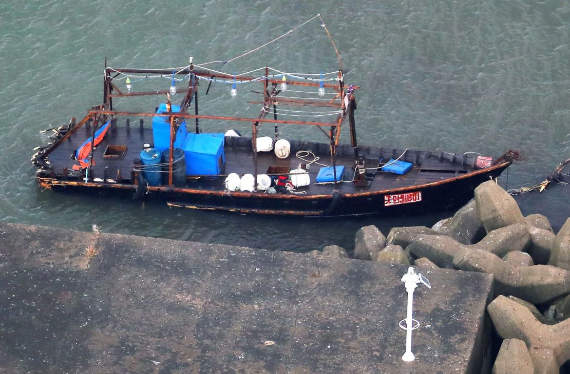 A wooden boat is moored at a nearby marina, in Yurihonjo, Akita prefecture, northern Japan, Friday, Nov. 24, 2017.   Japanese police are investigating eight men found on Japan's northern coast who say they are from North Korea and washed ashore after their boat broke down.  