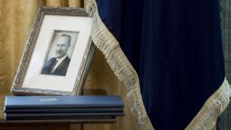 A photograph of Fred Trump, the father of US President Donald Trump, is seen in the Oval Office of the White House in Washington, DC, February 9, 2017. 