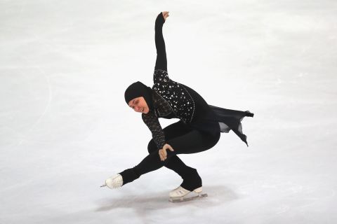 Lari has participated in professional figure skating competitions worldwide, wearing modified versions of the figure-skating outfit -- she replaces see-through fabrics such as Lycra with opaque cloth, covers her toned legs with thick leggings, and wears a matching headscarf.