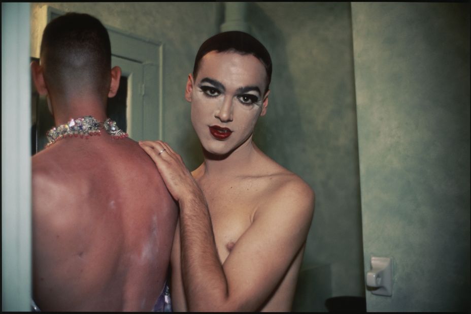 A new exhibition at Boston's Museum of Fine Arts explores the broad concept of family. In this shot, photographer Nan Goldin captures two drag queen friends in New York's East Village, with the goal of representing them as neither male nor female, but embodying an ideal "third gender." 